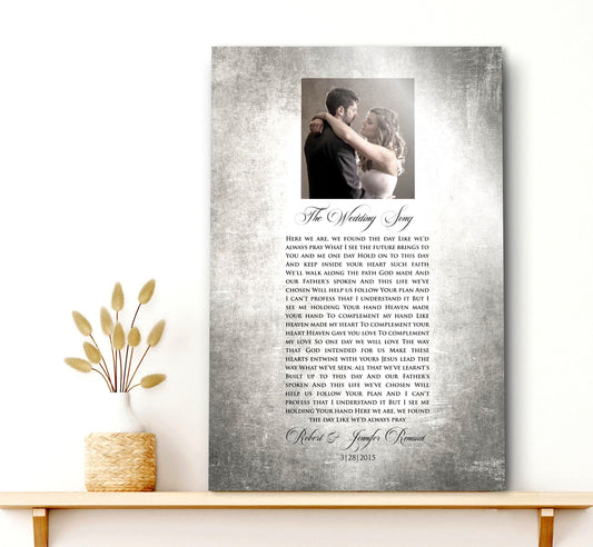 Custom Portrait plaque on tin for couples. Features the song lyrics or wording of choice and a photo cameo above the lyrics. This piece is handcrafted on vintage tin and is displayed on a single shelf with a rustic vase on the shelf to the left.
Courtesy of Honeycomb Proverbs