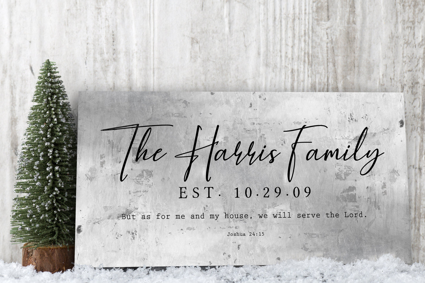 custom family name plaque is created on rustic and distressed tin, and features a family name prominently with the est. date. This is  Christian decor featuring Joshua  24:15 excerpt, "as for me and my house, we will serve the Lord".