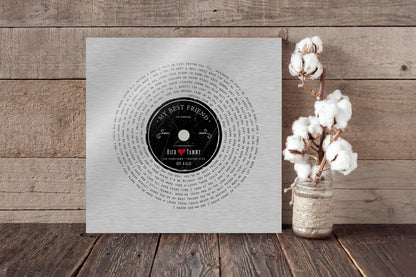 Ten Years Down LP Record Art, shown on the wall, 10th anniversary tin