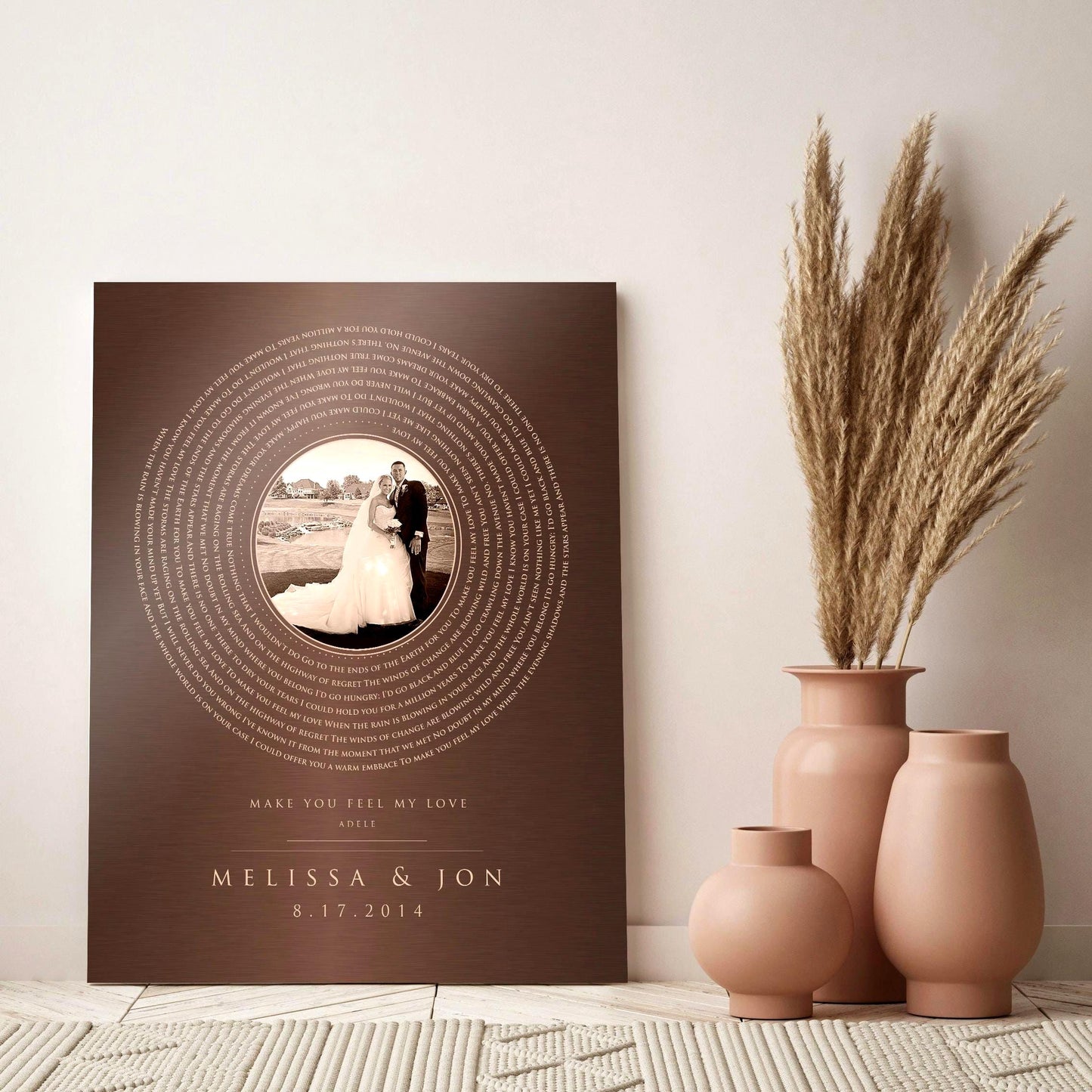 A a beautifully crafted bronze-alloy keepsake, personalized with your favorite photo, song, names, and date.