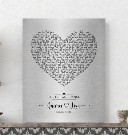 tin metal 1st dance sign with song lyrics for anniverTin Anniversary Heart Song Lyrics Plaque Celebrate your love with a stunning tin-alloy keepsake, featuring your special song arranged in a heart motif. Designed with whimsical calligraphy, this unique piece showcases the couple’s names connected by a heart beneath the lyrics.sary