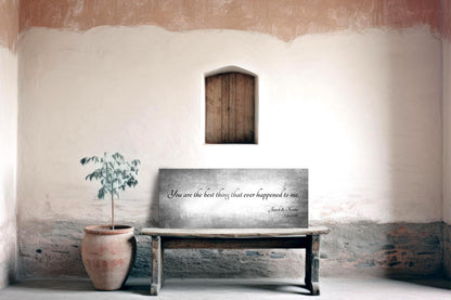 Tin quote sign reading "you are the best thing that ever happened to me" leaning on a bench, a 10th anniversary tin gift