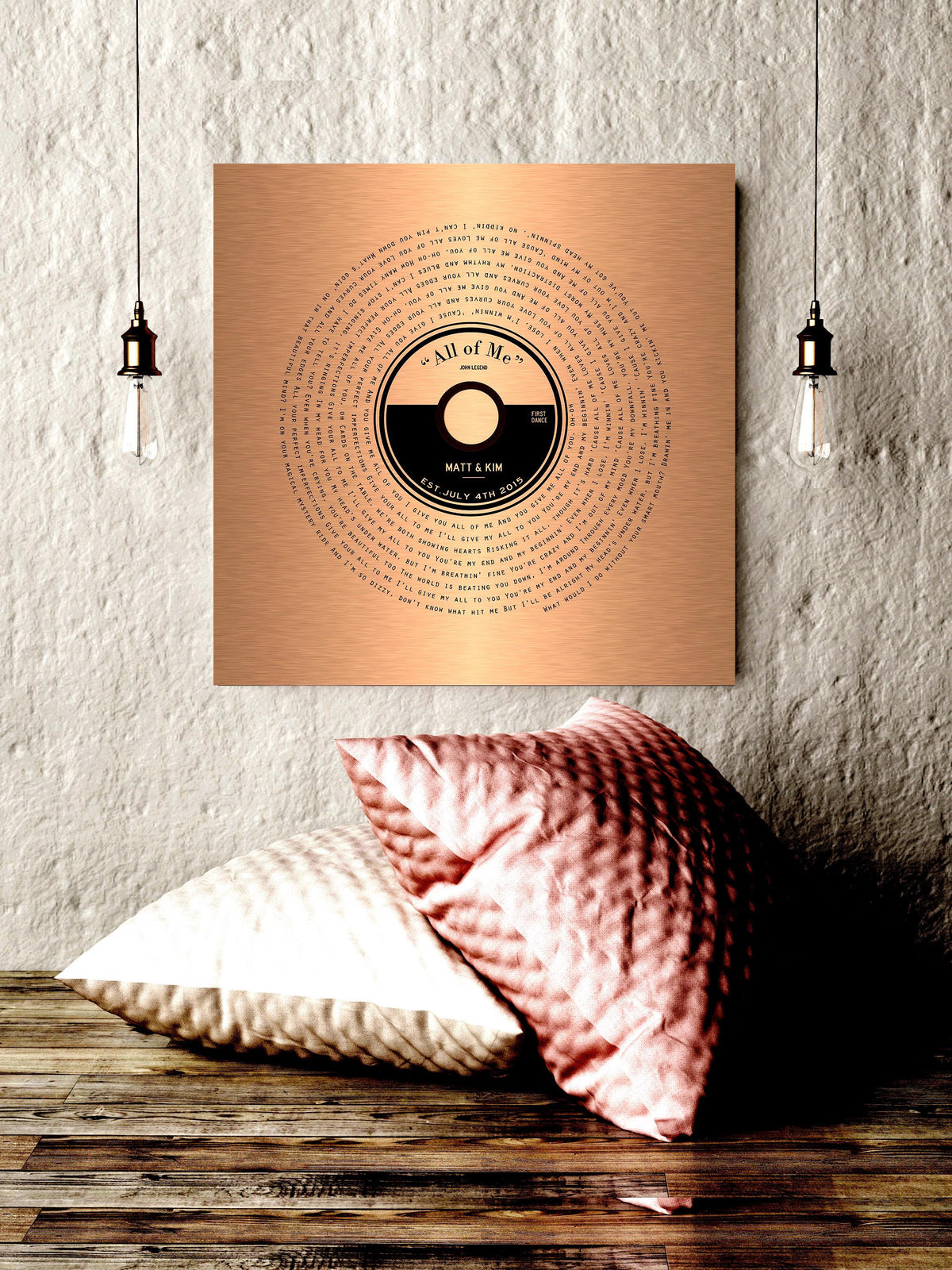 A custom copper song record art with personalized record label and song lyrics that wind around the round record label to crest a vinyl record design.