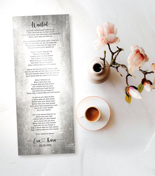 Tarnished Tin Anniversary Song plaque is personalized with Wanted as the title at the top and the lyrics to the song beneath. The names Eric and Kara and a wedding date sit at the bottom.