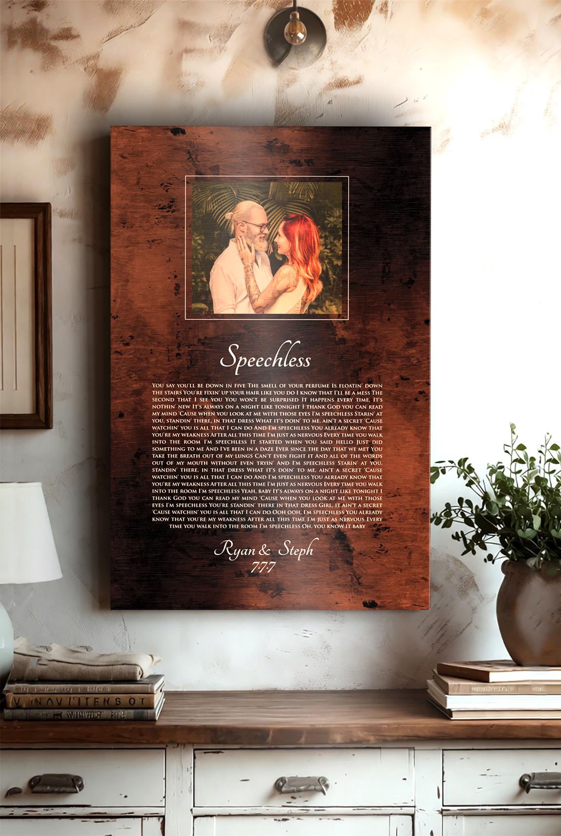 Bronze anniversary song plaque with photo of bride and groom framed at the top of plaque and song lyrics to Speechless beneath, followed by their names and wedding date.