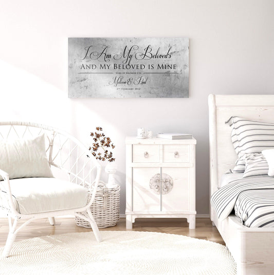 Large custom Christian wall art for couples on tarnished tin featuring a Song of Solomon verse "My beloved is Mine", two names and an established date - hangs on a bedroom wall.