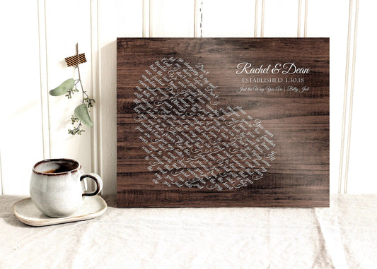 wood song plaque with custom lyrics shaped into a heart with names and wedding date