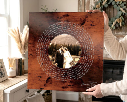 Bronze song record plaque with a wedding photo of a couple kissing at center, lyrics spiraling around, 8th anniversary