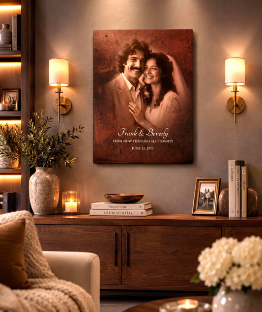 Custom Artisan Metal Wall Portrait for 8 year anniversary or 19th anniversary is a bronze portrait with personalized message. The Art is mounted on a wall in a cozy living space between wall sconces.