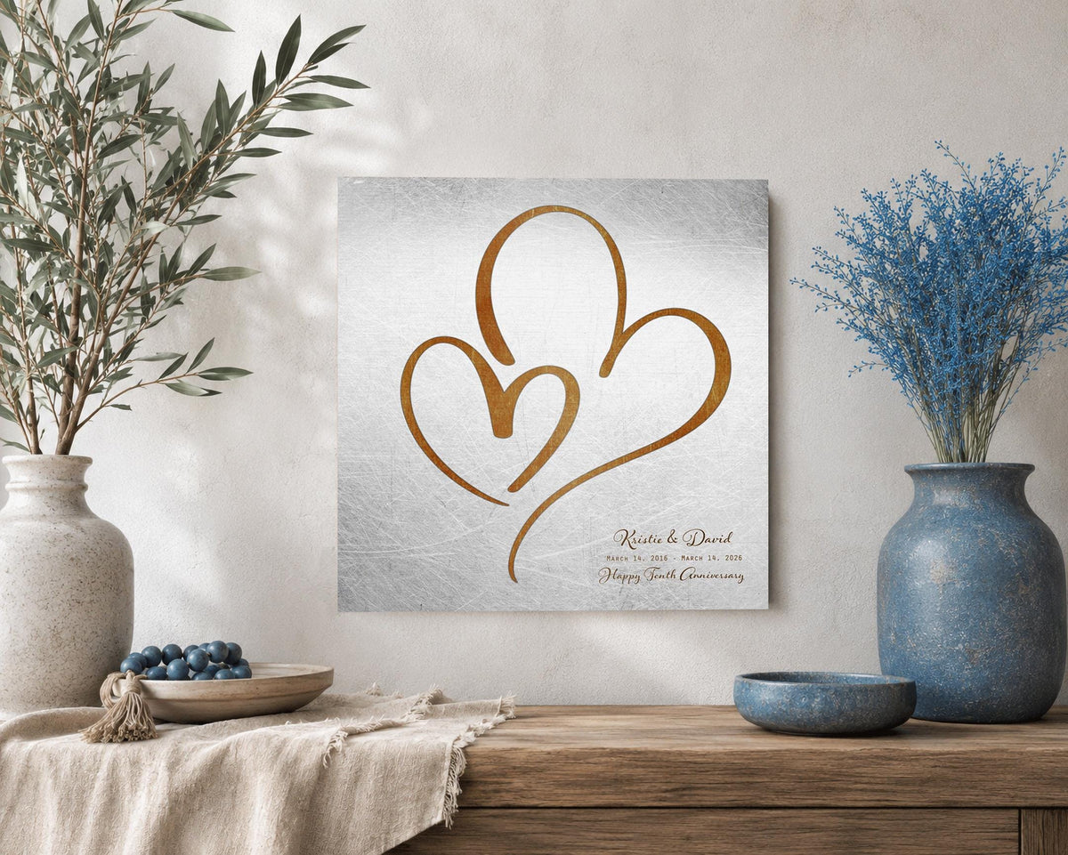 Ten Years Down Personalized Hearts Plaque on Tin, shown on the wall, 10th anniversary tin