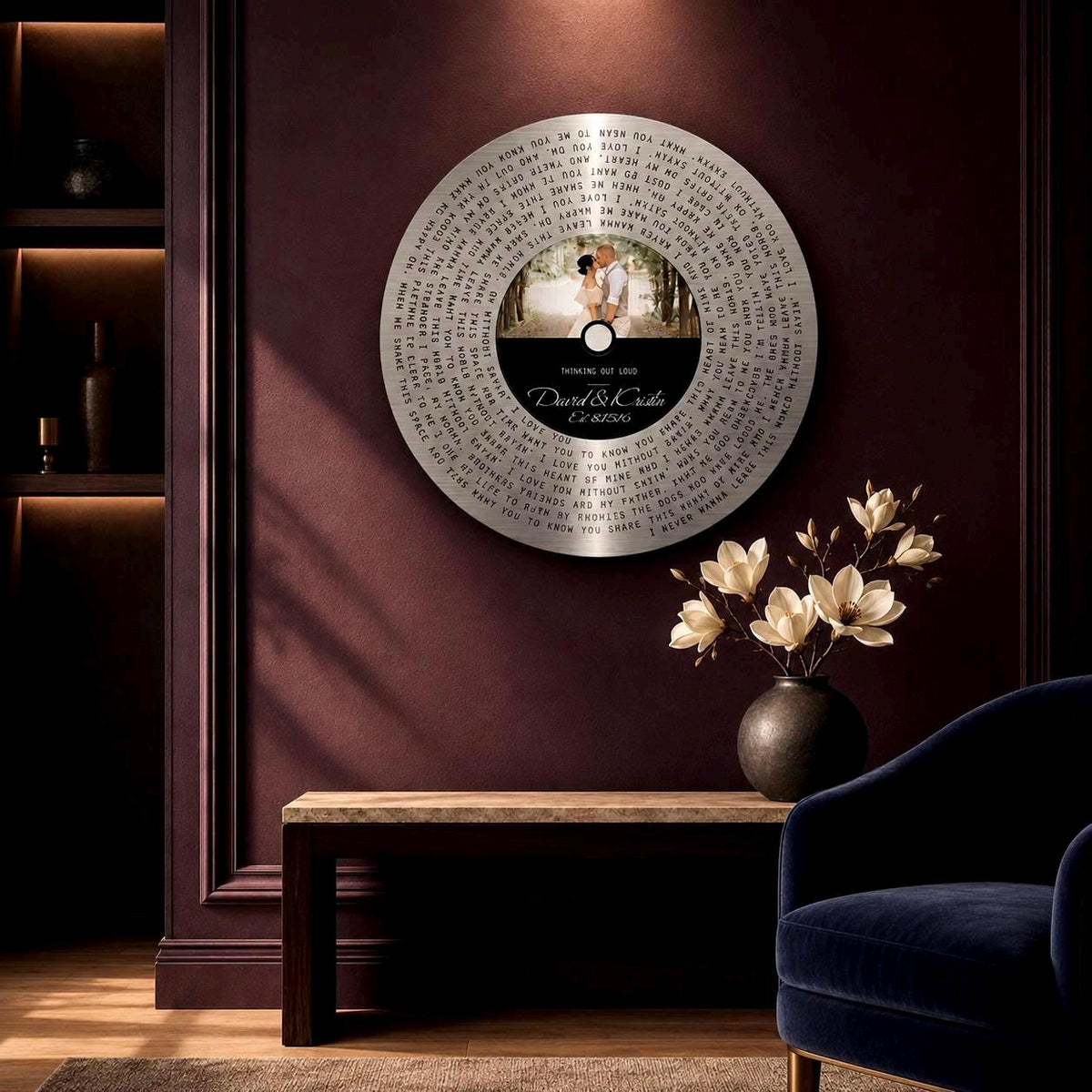 Round tin song lyrics record with names and established date on the label, burgundy wall