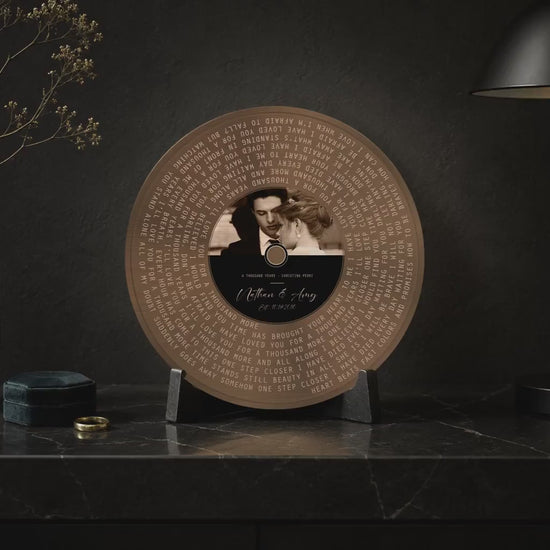 Video showing details of the personalized bronze round song lyrics record