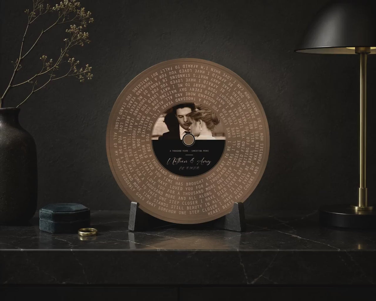 Video showing details of the personalized bronze round song lyrics record